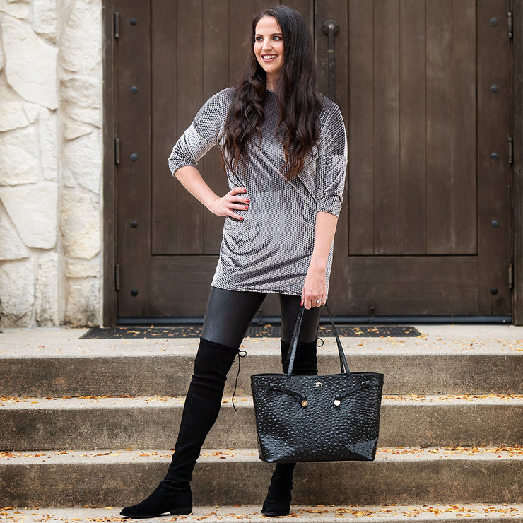 Swatzell + Heilig's Highland Bag in color Black, picture showing the bag with a model holding it in her hand