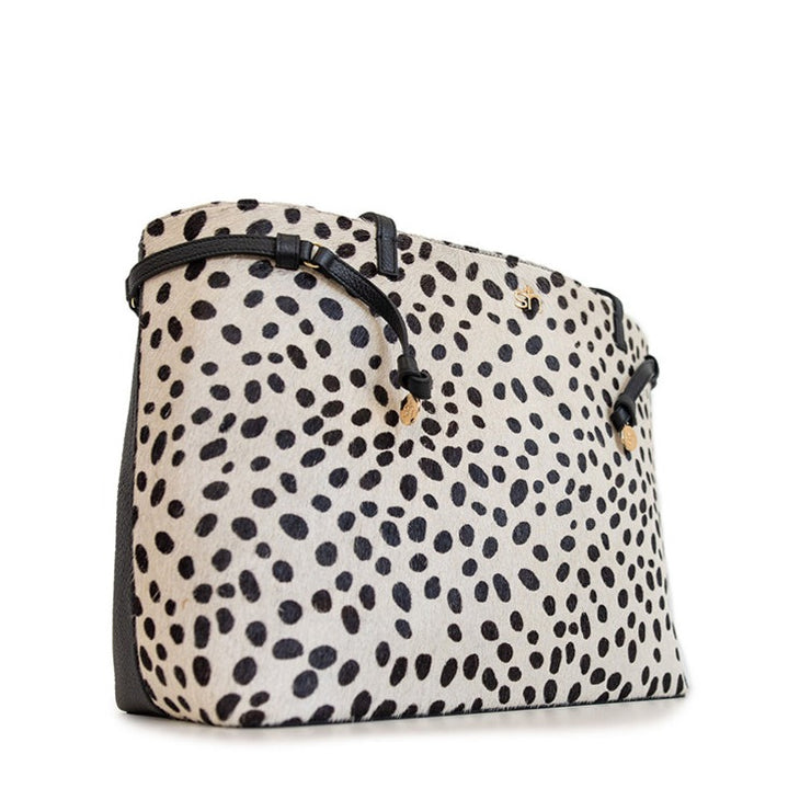 Swatzell + Heilig's Highland Bag in color Modern Cheetah, picture showing the left side of the item