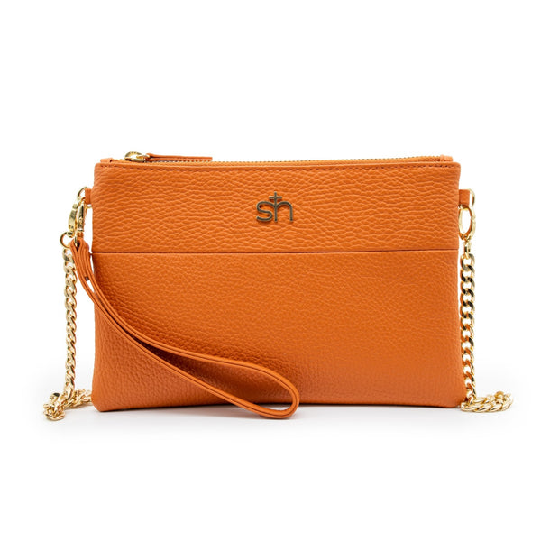A view of the front of the orange soho bag.Swatzell + Heilig's Soho Bag in color Honey Pumpkin, picture showing the front of the item