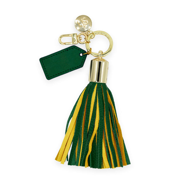 Swatzell + Heilig's Tassel keychain in color green, shown with the additional color of gold