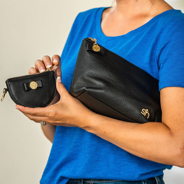 Swatzell + Heilig's Zip Coin Pouch in color Black, picture showing the item paired with the Soho bag